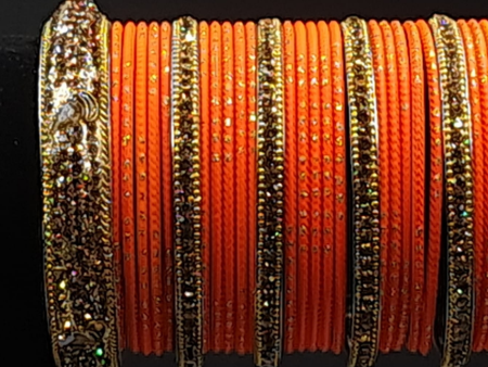 Touchstone indian bollywood orange and golden sparkling rhine stone vintage textured designer bangles set Online Hot Sale