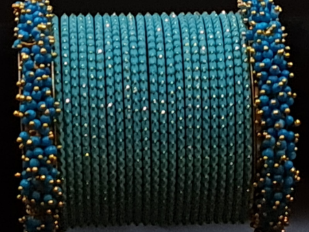 Turquise blue colour bangles set with deep blue beads cluster pearl kadas For Sale