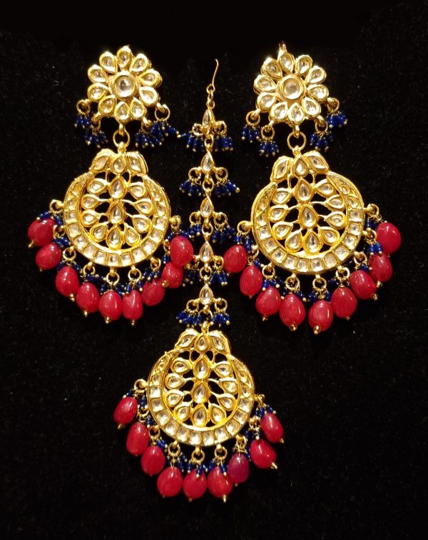 Bridal kundan piece is four layered set with dangling emeralds to match your festive. Hot on Sale