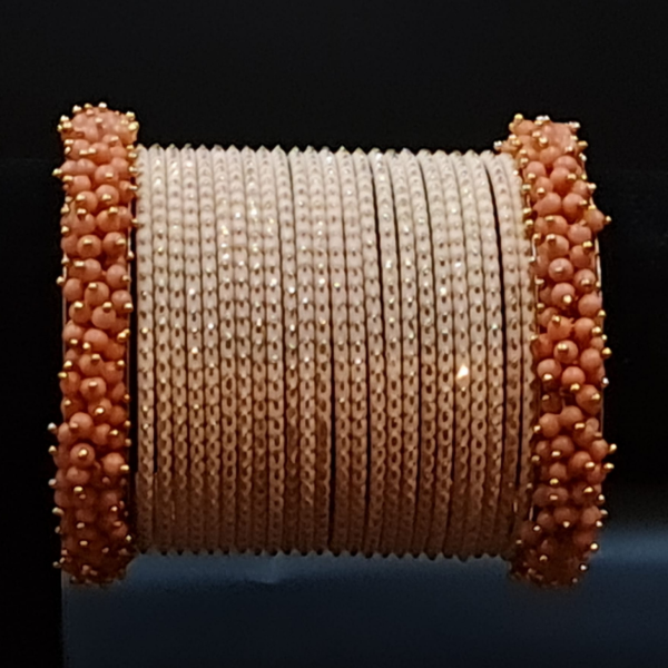 New stylish peach bangles with peach blush beaded gagra churi Online now