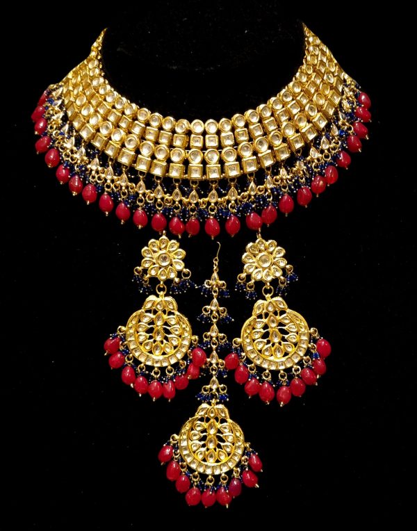 Bridal kundan piece is four layered set with dangling emeralds to match your festive. Hot on Sale