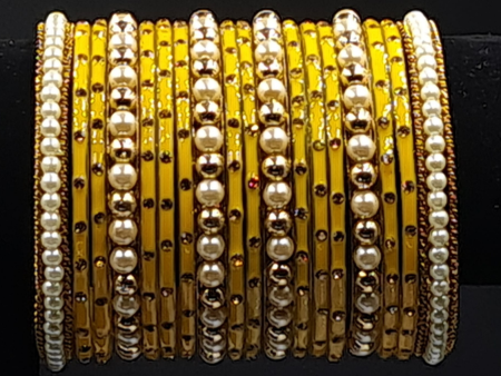 ( 2.8 )Golden dot yellow glass bangles with pearl and golden beads kangan For Sale